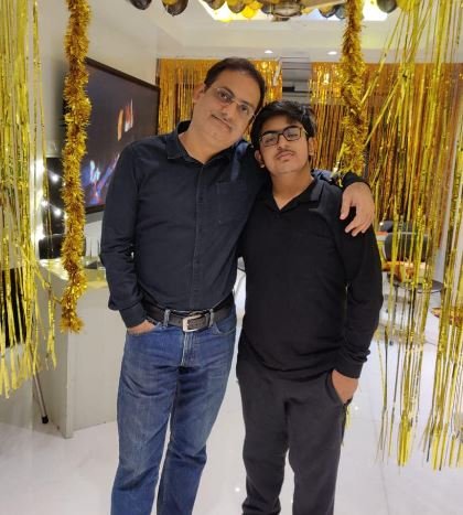 Dr. Vikas Divyakirti with his son